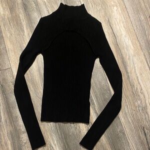 Chic Black Ribbed Turtleneck Sueter